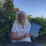 Stephanie_with_book_outdoors Stephanie_with_book_outdoors